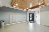Mailboxes are located on the first level of the builidng, just inside the door leading to the gated parking area.