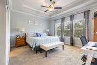 Master bedroom on main floor with views into private back yard.