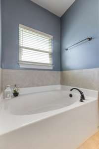 Soaking tub is also available in master bath.