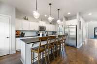 Another view of kitchen with pantry door.