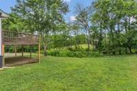 Beautiful backyard setting. Deck is 2 levles, upper and lower.