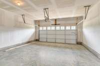 Two car attached garage. Photos from previously built Henley.