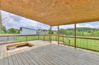 NOTE ABOUT BACK DECK:  The back deck includes a dedicated cut-out and electrical outlet for a hot tub. While the hot tub has been removed, the removable decking that covers the space will be reinstalled within the next few days.