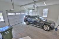 Extra large 2-car garage with pedestrian door (3rd car is seperate)