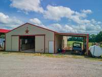 36x48 5 stall horse barn with 12x24 lean to. Barn is concreted has power and water ran to it.