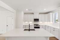 Imagine having the family over for dinner with this kitchen-- be prepared to be the envy of your friends and loved ones! Actual photo of home.