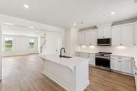 Enormous kitchen, sizable living space-- why settle for less? Actual photo of home.