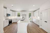 The BEST kitchen you will find in a townhome anywhere! Does your current kitchen have this much storage and preparation space? If not, it's time to upgrade! Actual photo of home.