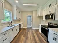 Cabinets to the ceiling! Lots of open counter space