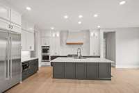 As you enter the gourmet kitchen, you're immediately struck by its sophisticated design, which maximizes every inch of available space to create a culinary oasis that is both stylish and practical.