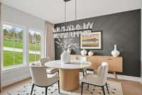 Entertain guests in the sophisticated dining room, perfect for hosting intimate gatherings or lavish dinner parties.