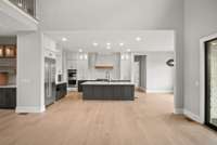 Welcome to your dreamy gourmet kitchen, where culinary aspirations come to life amidst a backdrop of exquisite design and unparalleled functionality. All Photos of Previously Built Homes & NOT Actual Home.
