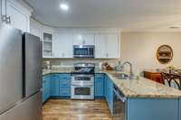 Double ovens, microwave and dishwasher, new recessed lighting as well as upper cabinets (to ceiling), lower cabinets and granite countertops all upgraded within last 2.5 years