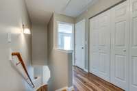 Laundry facilities conveniently located between bedrooms. Attic storage access and spacious linen closet in upstairs hallway