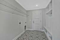 Adorable laundry room with drop zone!
