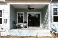 So much room out here to use however you may like! Perfect for back porch sitting or entertaining guests!!