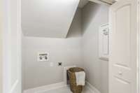 Right off the kitchen is this very spacious laundry room!