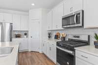 This is a photo of one of our model homes. Please know that some of the exterior and interior finishes, paint, and features may vary.