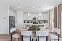 This is a photo of one of our model homes. Please know that some of the exterior and interior finishes, paint, and features may vary.