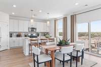 This is a photo of one of our model homes. Please know that some of the exterior and interior finishes, paint, and features may vary.