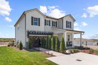 This is a photo of one of our model homes. Please know that some of the exterior and interior finishes, paint, and features may vary.