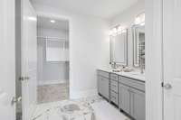 Primary bath/suite joins the primary bedroom,  This also connects to a large walk in closet.