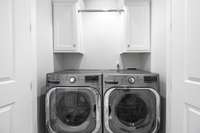Washer and dryer remain with the condo