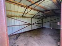 Outbuilding with concrete floor
