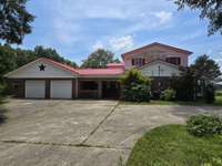 Attached two car garage, covered patio
