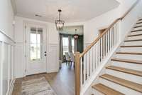 Model home-similar plan-this home will have a second bedroom and bath down in lieu of the office and half bath shown here.