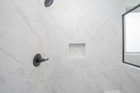 Large walk-in shower with soap niche