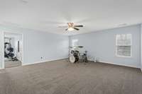 View of open loft as well as view into bedroom #3