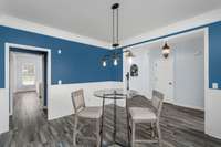 Notice the wainscoting on the walls in this room