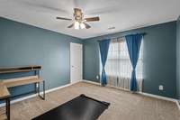Bedroom 2 at the top of the stairs.  Furniture does not convey.
