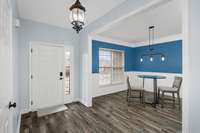 Coat closet on the right as you enter and formal dining room/office space on the left