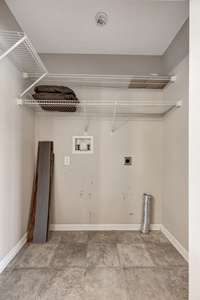 Washer and dryer hookups + additional storage off kitchen area.