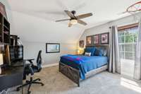 Bedroom 5 features a ceiling fan, a large window for natural light, and soft carpet flooring for added comfort.2819 Silver Springs Ct   Murfreesboro, TN 37128