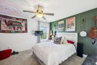 Upstairs, Bedroom 2 features a stylish boarded green accent wall that adds a pop of personality.  2819 Silver Springs Ct   Murfreesboro, TN 37128