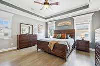 The large primary suite is located on the main level and features elegant tray ceilings, a ceiling fan, and plenty of windows that flood the room with natural light. 2819 Silver Springs Ct   Murfreesboro, TN 37128