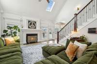 The living room boasts grand ceilings and abundant natural light from multiple windows and skylights.  2819 Silver Springs Ct   Murfreesboro, TN 37128