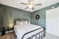 A large window, ceiling fan, and plush carpet flooring create a bright and comfortable retreat in Bedroom 4. 2819 Silver Springs Ct   Murfreesboro, TN 37128