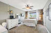 The third bedroom features carpeted flooring, a large window, and a ceiling fan for year-round comfort.2819 Silver Springs Ct   Murfreesboro, TN 37128