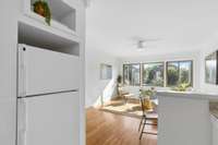 The kitchen opens directly to the living area, creating an easy flow that’s great for both everyday living and hosting.