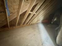One of two attic storage spaces off of bedroom 4 upstairs