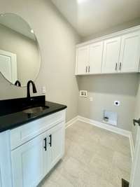 Laundry room with sink