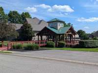 Neighborhood picnic pavilion not far from playground. Offers guest parking and lovely views...