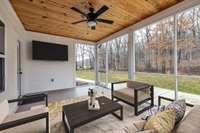 Imagine relaxing on the screened in porch  Room has been virtually staged.