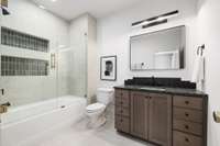 Each additional bedroom is accompanied by its own full bath, ensuring unparalleled comfort for family members or guests.