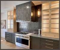 The cabinets, reaching all the way to the ceiling, exude sophistication and provide ample storage space for all your culinary essentials. TO BE BUILT - Buyer can customize ALL structural & designer options.