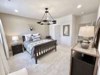 Welcome your guests with a spacious and private upstairs guest suite, offering comfort, elegance, and tranquility.
